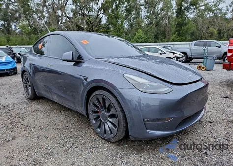 2023 Tesla Model Y from USA, damaged, VIN 7SAYGDEF4PF615930